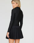 Elegant and functional - you'll love the black long sleeve zip top by Goldie Byrd!